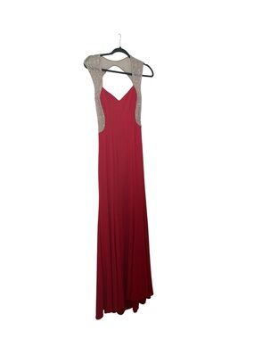 Lady in Red Evening Gown with Embellished Shoulders